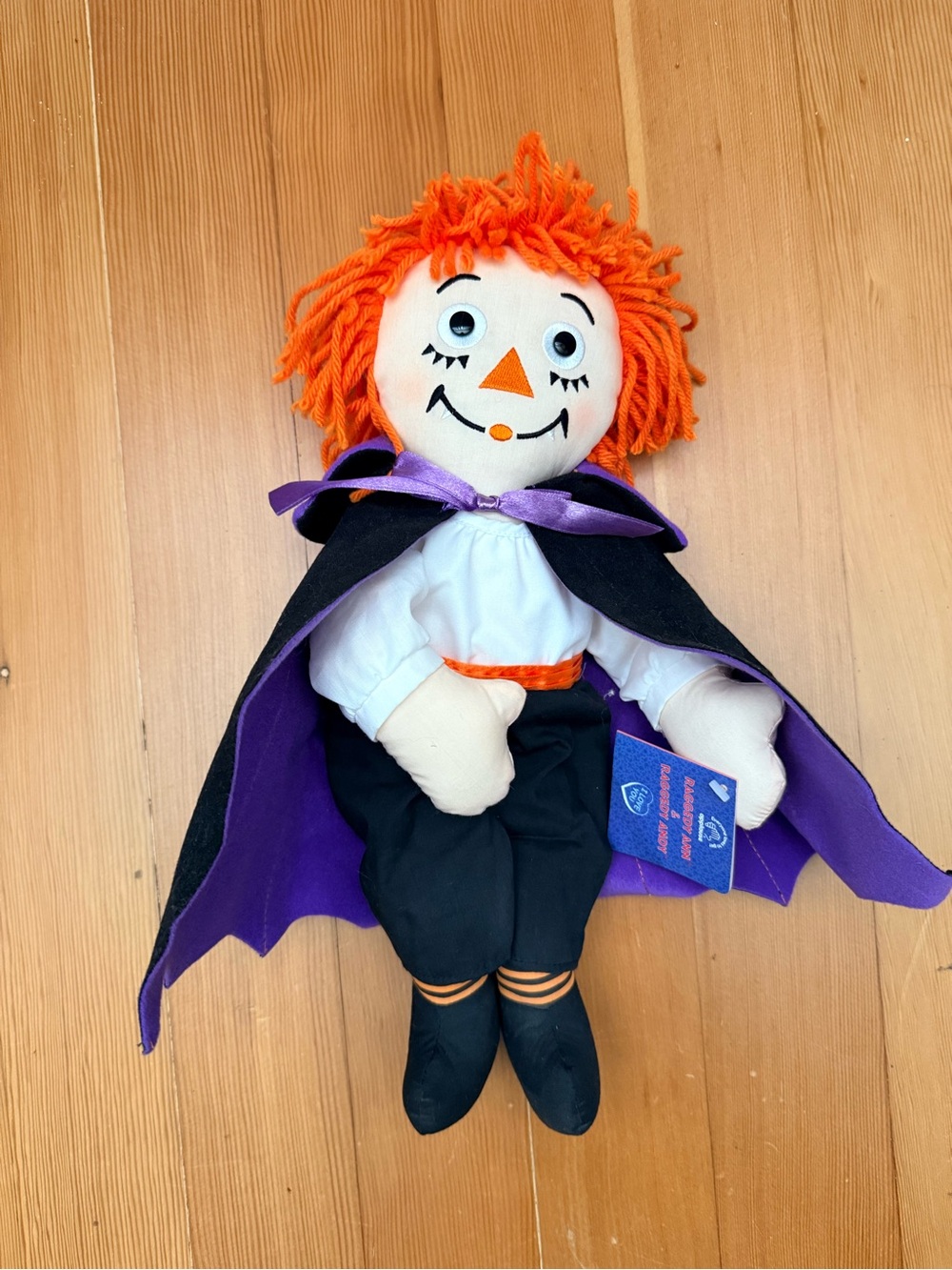Orange-Haired Rag Doll Halloween Costume with Purple Cape